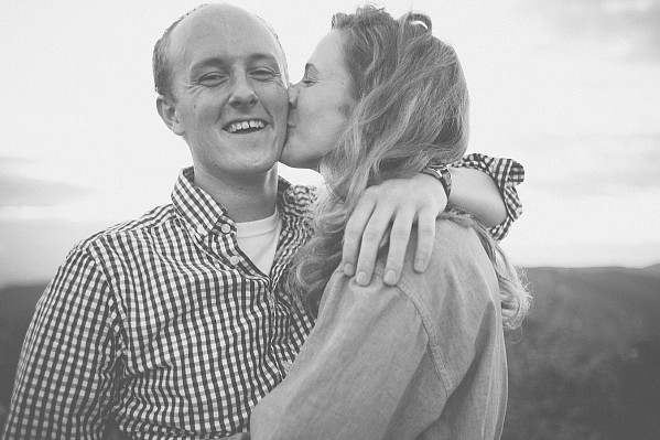 Sarah and Patrick's engagement session took place on Hawksbill Mountain overlooking Linville Gorge in western North Carolina.